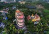 Bí ẩn đằng sau ngôi chùa hồng có rồng khổng lồ quấn quanh